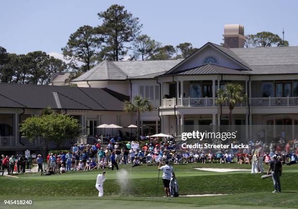 Luke Donald of England plays his third shot from a greenside bunker on the ninth hole during the first round of the 2018 RBC Heritage at Harbour Town...