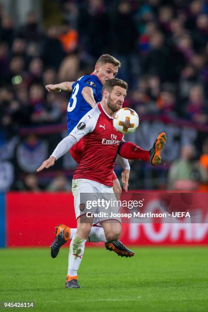 Fedor Chalov of CSKA Moskva competes with Shkodran Mustafi of Arsenal during the UEFA Europa League quarter final leg two match between CSKA Moskva...