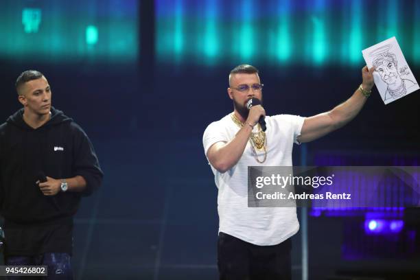 Farid Bang and Kollegah are seen on stage teasing Campino of Die Toten Hosen during the Echo Award show at Messe Berlin on April 12, 2018 in Berlin,...