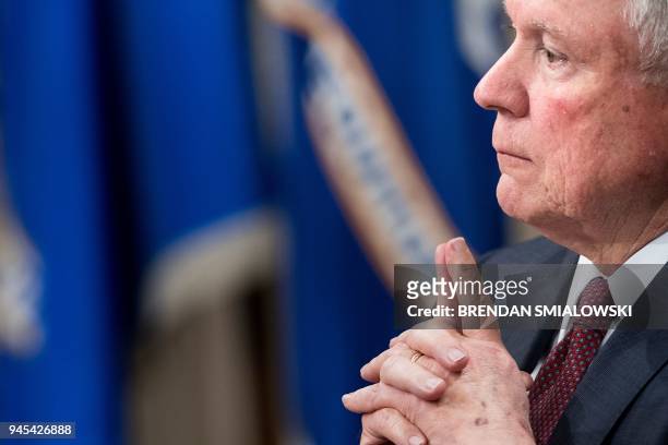 Attorney General Jeff Sessions waits to speak during an event honoring the 50th anniversary of the Fair Housing Act at the Department of Justice...
