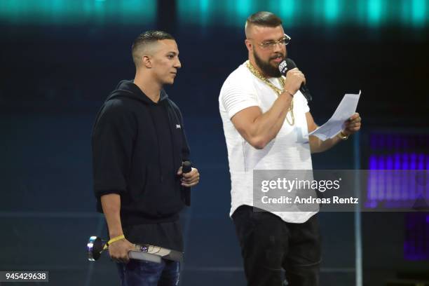 Hip-Hop/Urban - National' award winners Farid Bang and Kollegah speak on stage during the Echo Award show at Messe Berlin on April 12, 2018 in...