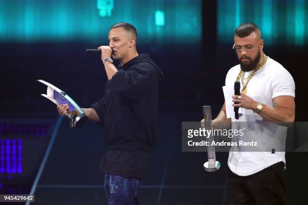 Hip-Hop/Urban - National' award winners Farid Bang and Kollegah speak on stage during the Echo Award show at Messe Berlin on April 12, 2018 in...