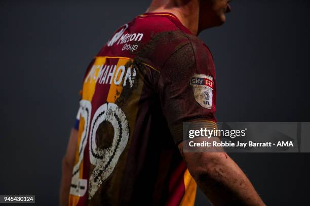 Mud is seen on the sleeves of Anthony McMahon of Bradford City during the Sky Bet League One match between Bradford City and Shrewsbury Town at Coral...