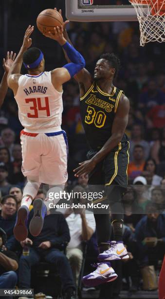Tobias Harris of the LA Clippers is blocked by Julius Randle of the Los Angeles Lakers in the first half at Staples Center on April 11, 2018 in Los...