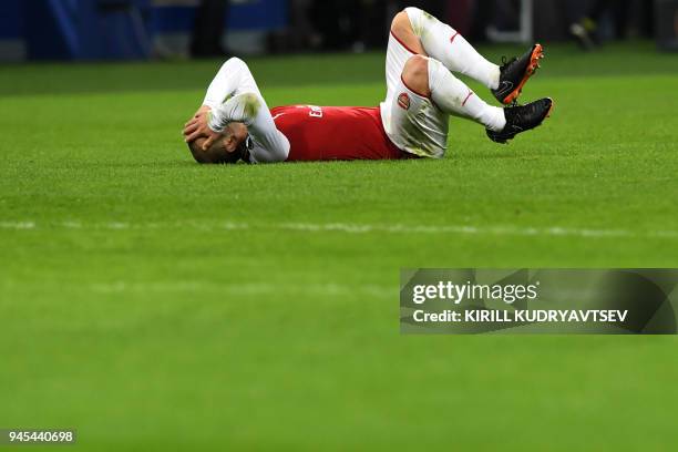 Arsenal's English midfielder Jack Wilshere reacts during the UEFA Europa League second leg quarter-final football match between CSKA Moscow and...