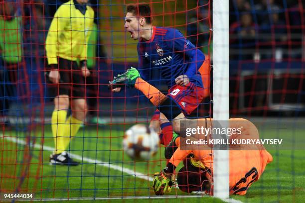 Moscow's Russian defender Kirill Nababkin celebrates scoring during the UEFA Europa League second leg quarter-final football match between CSKA...