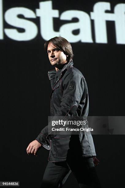 Model Marcus Schenkenberg presents a creation by Belstaff during the 'Belstaff Presents New Uniforms For Italian Police' at the Direzione Generale di...
