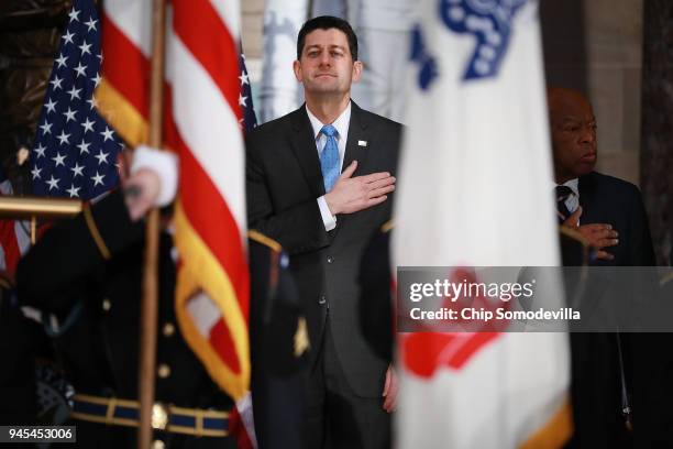Speaker of the House Paul Ryan puts his hand over his heart as the national anthem is performed during a ceremony to mark the 50th anniversary of the...