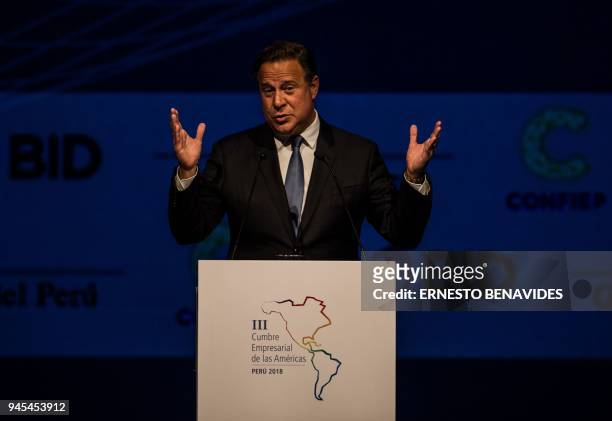 Panama's President Juan Carlos Varela delivers a speech during the III Americas Business Summit, in Lima, on April 12, 2018. / AFP PHOTO / Ernesto...