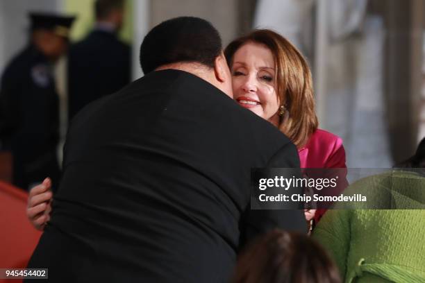 Martin Luther King III embraces House Minority Leader Nancy Pelosi at the conclusion of a ceremony to mark the 50th anniversary of the assassination...