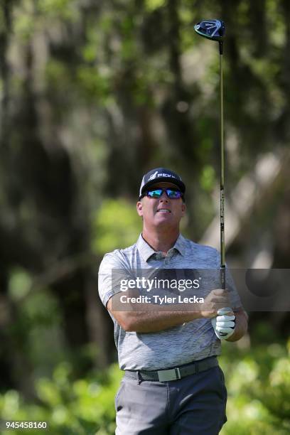 Points watches his tee shot on the eighth hole during the first round of the 2018 RBC Heritage at Harbour Town Golf Links on April 12, 2018 in Hilton...