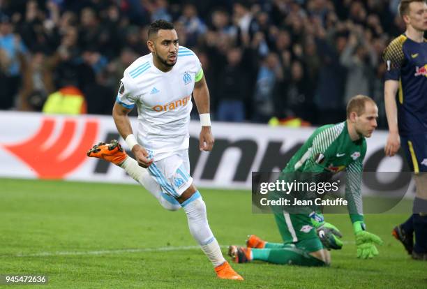 Dimitri Payet of OM celebrates scoring the fourth goal for Marseille while goalkeeper of RB Leipzig Peter Gulacsi reacts during the UEFA Europa...