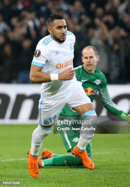 Dimitri Payet of OM celebrates scoring the fourth goal for Marseille while goalkeeper of RB Leipzig Peter Gulacsi reacts during the UEFA Europa...