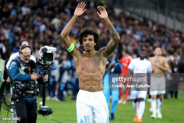 Luiz Gustavo of OM celebrates the qualification for the semis following the UEFA Europa League quarter final leg two match between Olympique de...