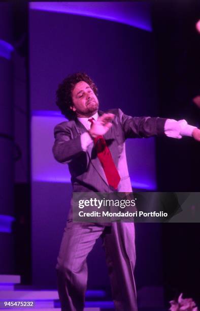 The comedian Beppe Grillo performing at the 39th Sanremo Music Festival. Sanremo, Italy. 1989