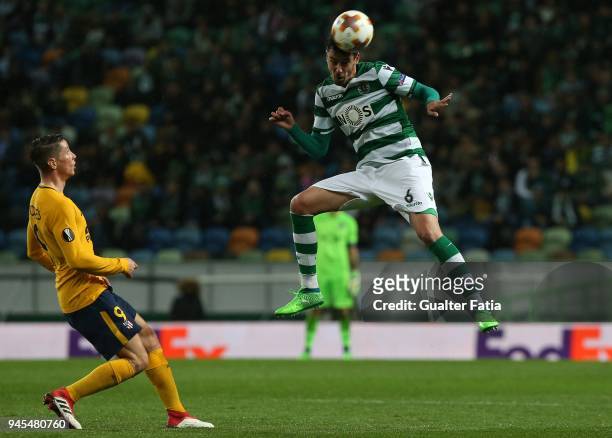 Sporting CP defender Andre Pinto from Portugal with Club Atletico de Madrid forward Fernando Torres from Spain in action during the UEFA Europa...