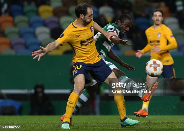 Sporting CP forward Seydou Doumbia from Ivory Coast with Club Atletico de Madrid defender Juanfran from Spain in action during the UEFA Europa League...