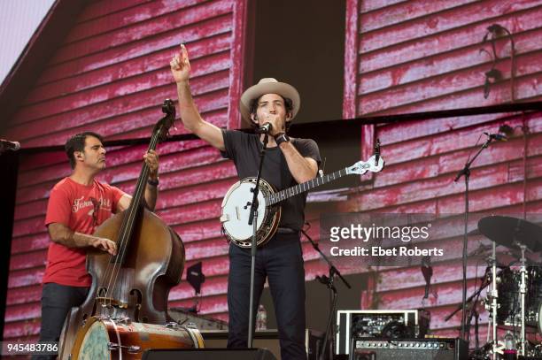 Bob Crawford and Scott Avett of The Avett Brothers perform at Farm Aid at the KeyBank Pavilion in Burgettstown, Pennsylvania, United States on...