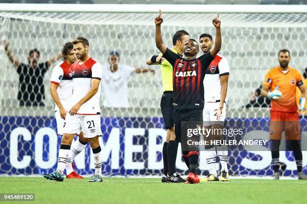 Brazil's Atletico Paranaense player Nikao celebrates after scoring against Argentinas Newell's Old Boys during their Copa Sudamericana first stage...