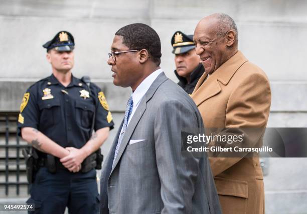 Actor/ stand-up comedian Bill Cosby and his publicist Andrew Wyatt leaving the Montgomery County Courthouse during the fourth day of his retrial for...