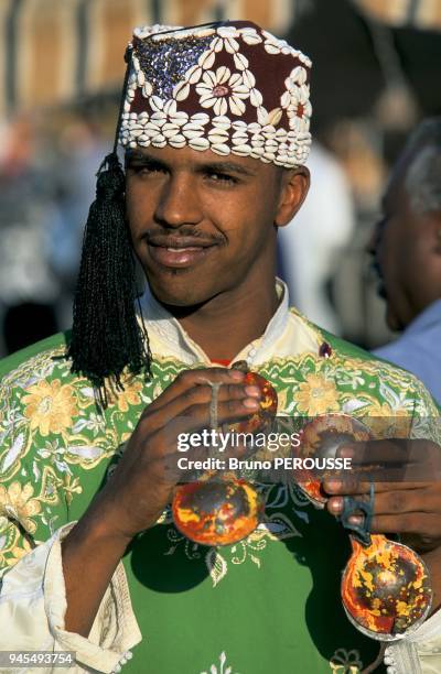 PORTRAIT OF A CASTANETS MUSICIAN, MOROCCO.