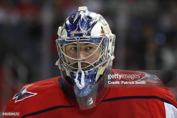 Goalie Philipp Grubauer of the Washington Capitals looks on against the Columbus Blue Jackets in the first period in Game One of the Eastern...