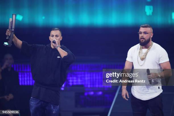 Hip-Hop/Urban - National' award winners Farid Bang and Kollegah speak on stage during the Echo Award show at Messe Berlin on April 12, 2018 in...