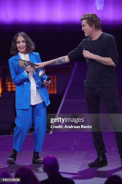 Alice Merton and 'Rock - National' award winner Campino of Die Toten Hosen are seen on stage during the Echo Award show at Messe Berlin on April 12,...