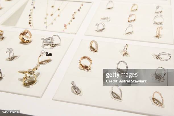 View of rings on display as Swarovski brand ambassador, Karlie Kloss cuts the ceremonial ribbon at the brands latest flagship location in New York...