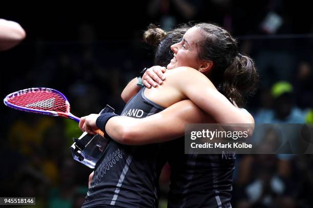 Joelle King and Amanda Landers-Murphy of New Zealand celebrates victory during their Women's Doubles Quarterfinal Squash match on day nine of the...