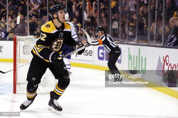 Sean Kuraly of the Boston Bruins celebrates after scoring a goal against the Toronto Maple Leafs during the third period of Game One of the Eastern...