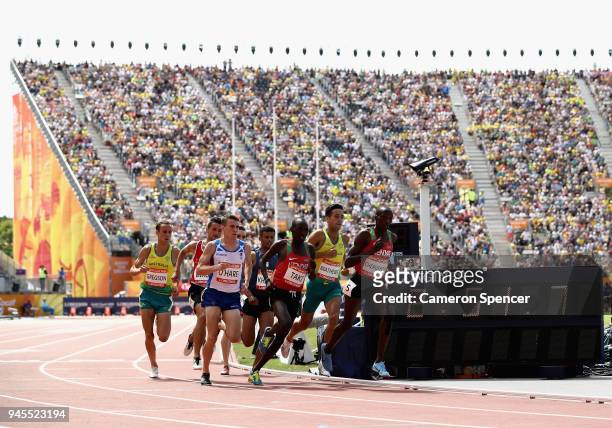 Chris O'Hare of Scotland, Kumari Taki of Kenya, Luke Mathews of Australia and Timothy Cheruiyot of Kenya compete in the Men's 1500 metres heats...