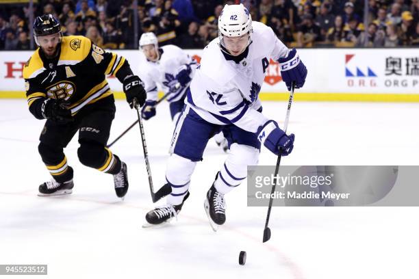 David Krejci of the Boston Bruins defends Tyler Bozak of the Toronto Maple Leafs during the third period of Game One of the Eastern Conference First...