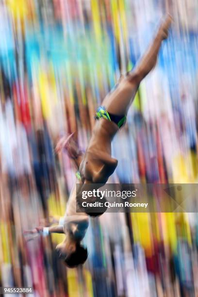 Jellson Jabillin and Hanis Nazirul Jaya Surya of Malaysia compete in the Men's Synchronised 10m Platform Diving Final on day nine of the Gold Coast...