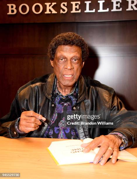 Former professional basketball player Elgin Baylor signs copies of his new book "Hang Time: My Life in Basketball" at Barnes & Noble at The Grove on...