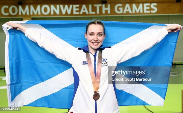 Bronze medalist Seonaid Mcintosh of Scotland poses during the medal ceremony for the Women's 50m Rifle 3 Positions Final during the Shooting on day...