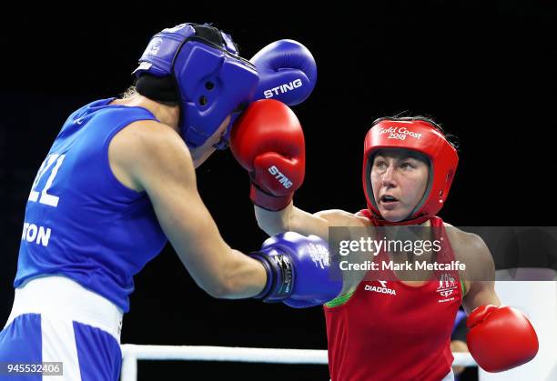 Anja Stridsman of Australia and Troy Garton of New Zealand compete in their Women's Light 57-60kg Semifinal bout during Boxing on day nine of the...