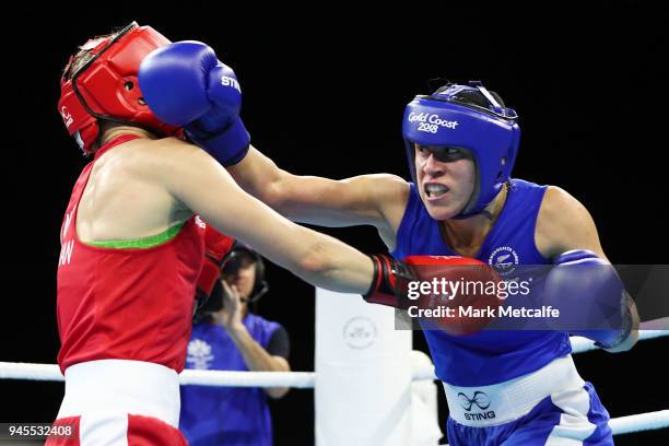 Anja Stridsman of Australia and Troy Garton of New Zealand compete in their Women's Light 57-60kg Semifinal bout during Boxing on day nine of the...