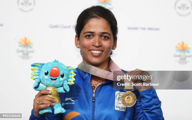 Gold medalist Tejaswini Sawant of India poses during the medal ceremony for the Women's 50m Rifle 3 Positions Final during the Shooting on day nine...