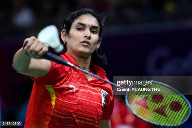 India's Ruthvika Gadde hits a return against Scotland's Kirsty Gilmour during their badminton women's singles quarter-final match at the 2018 Gold...