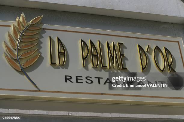 Sign of the 'Palme d'Or' restaurant. "Enseigne restaurant ""palme d'Or""".