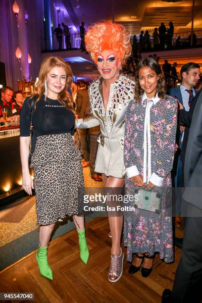 German presenter and model Palina Rojinski, Drag Queen Olivia Jones and Rabea Schif during the Echo Award after show party at Palais am Funkturm on...