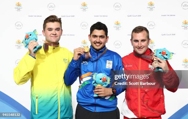 SilverÊmedalist Sergei Evglevski of Australia, gold medalist Anish of India and bronze medalist Sam Gowin of England pose during the medal ceremony...