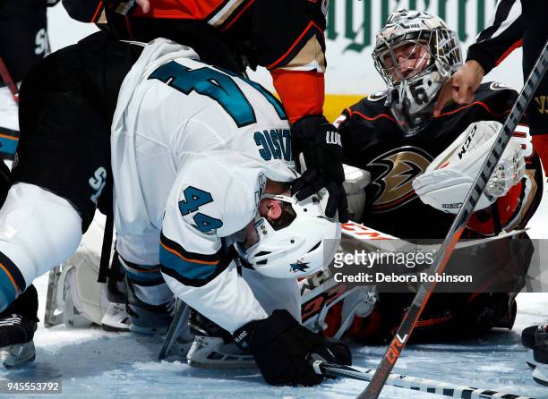 Marc-Edouard Vlasic of the San Jose Sharks battles against John Gibson of the Anaheim Ducks in Game One of the Western Conference First Round during...