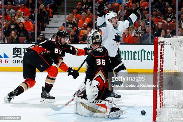 Chris Tierney of the San Jose Sharks celebrates a second period goal against John Gibson and Marcus Pettersson of the Anaheim Ducks in Game One of...