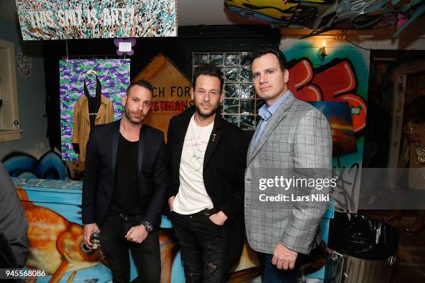 Artists Phil Reese, Jeremy Penn and proprietor Joe Lapadula attend the Sold Out Art Auction To Benefit Camp For Children With Cancer on April 12,...