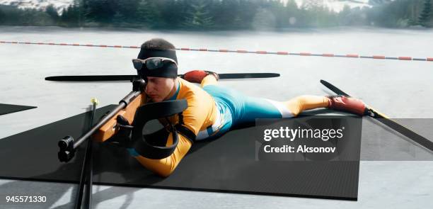 athletic man at the biathlon competitions - biathlon ukraine stock pictures, royalty-free photos & images