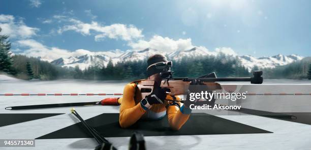 athletic man at the biathlon competitions - biathlon ukraine stock pictures, royalty-free photos & images