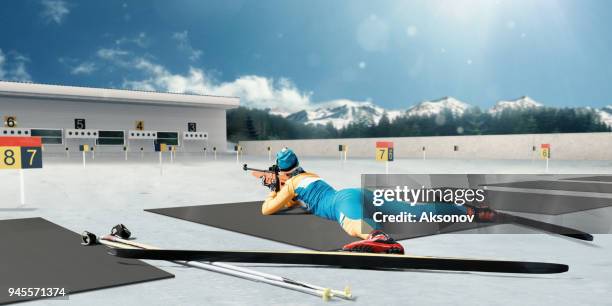 athletic woman at the biathlon competitions - biathlon ukraine stock pictures, royalty-free photos & images