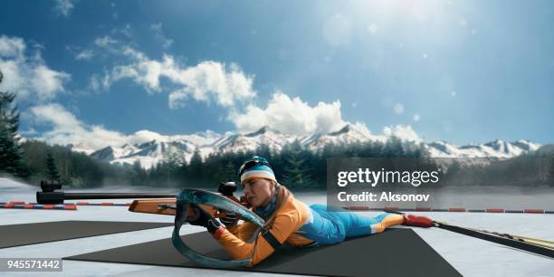 athletic woman at the biathlon competitions - biathlon ukraine stock pictures, royalty-free photos & images